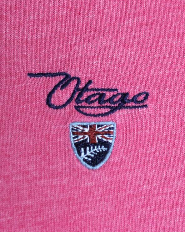 Broderie côté coeur du polo Griff Otago fushia pour homme