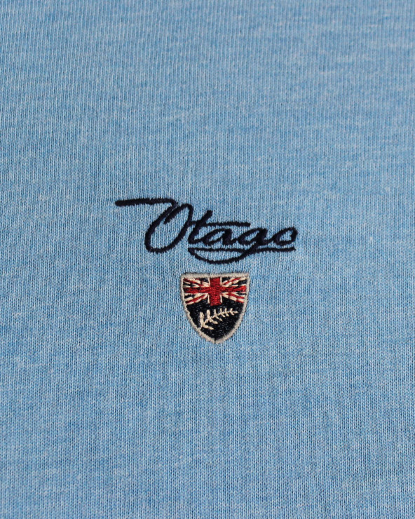 Broderie côté coeur du polo Griff Otago ciel chiné pour homme