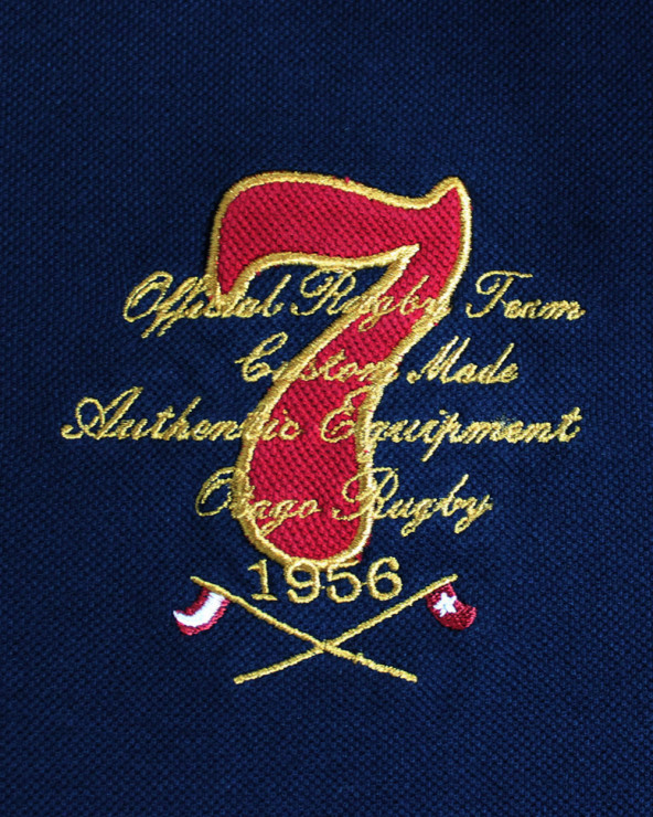 Broderie côté droit du polo Miller Otago marine et bordeaux pour homme