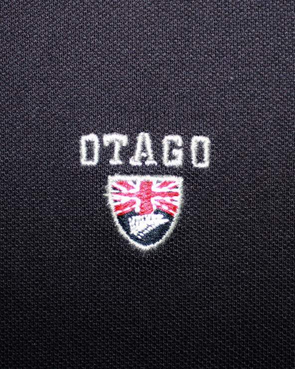 Broderie côté coeur du polo Montlery Otago bleu marine pour homme