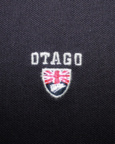 Broderie côté coeur du polo Montlery Otago bleu marine pour homme