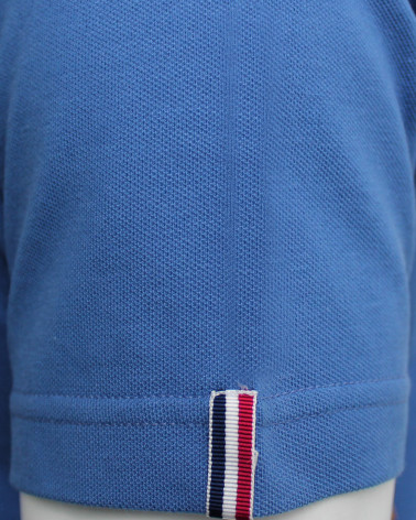Vignette tissée sur la manche gauche du polo Montlery Otago bleu lavande pour homme