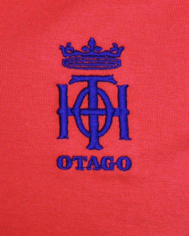 Broderie côté coeur du polo Oth Otago rouge pour homme