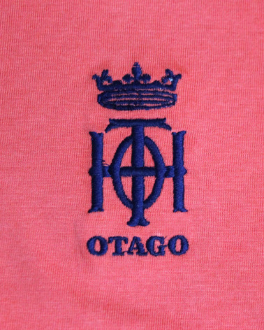 Broderie côté coeur du polo Oth Otago corail pour homme