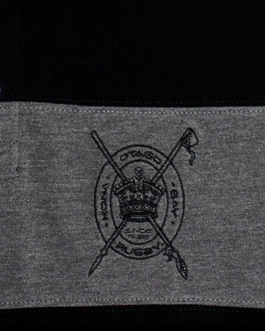 Broderie coté coeur du polo Marty Otago gris/noir pour homme