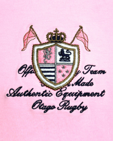 Broderie côté coeur du polo Rob Otago marine et rose pour homme