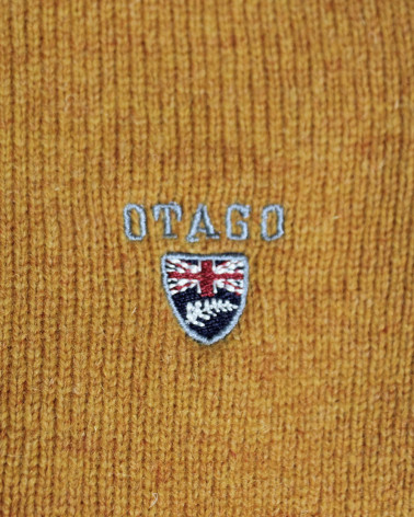 Broderie côté coeur du pull Buenos aires col zip Otago moutarde pour homme