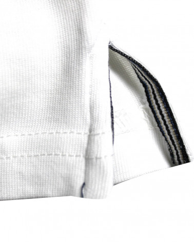 Patte avec liseré aux ouvertures latérales du polo Tikland Otago écru pour homme