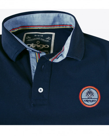 Broderie côté coeur du polo Flosset marine pour homme