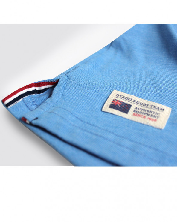 Génuine cousue en bas côté droit du polo Serioustag Otago bleu ciel chiné pour homme