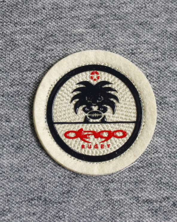 Ecusson cousu côté coeur du polo Swansea Otago gris clair pour homme
