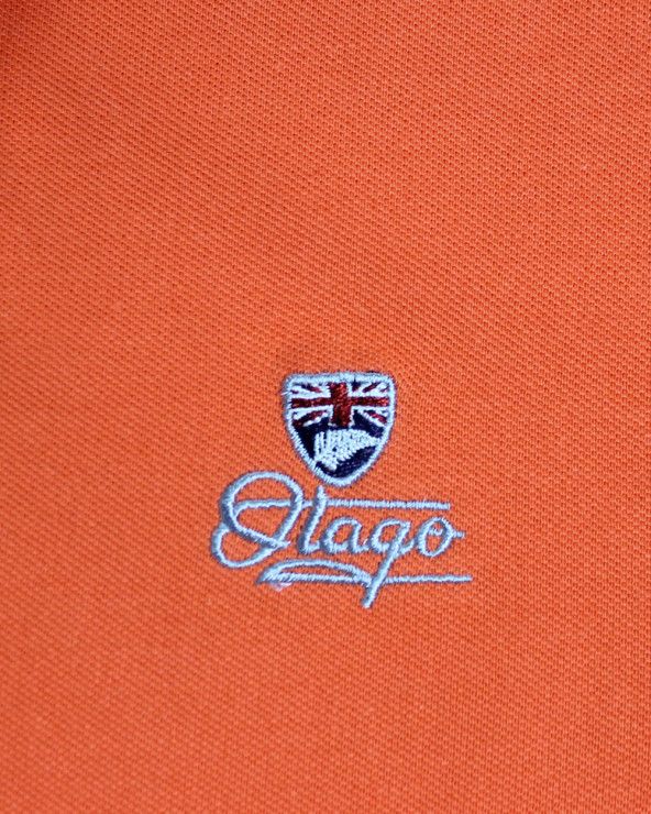 broderie côté cœur du polo Griffax orange pour homme