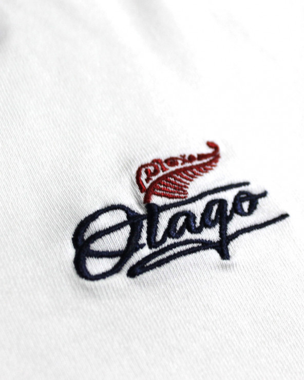 Broderie côté coeur du polo Jeany Otago écru pour homme