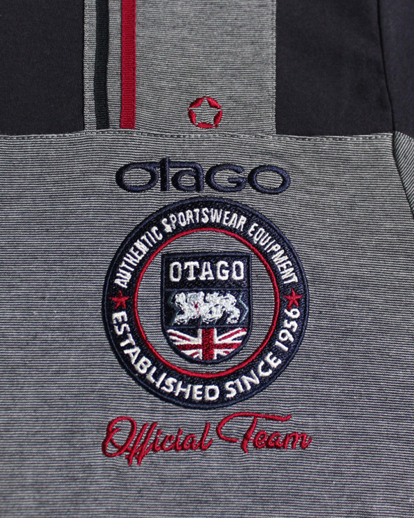 Ensemble brodé côté coeur du polo Otabadge Otago rayé marine pour homme