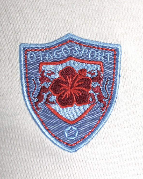 Broderie côté coeur du polo Tortue7 Otago écru pour homme