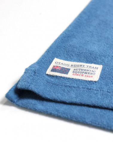 Génuine Otago cousue en bas à droite du polo Towel Otago riviera blue pour homme