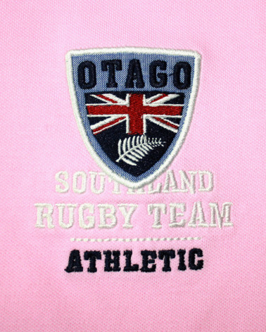 Broderie côté coeur du polo Artax Otago rose pour homme