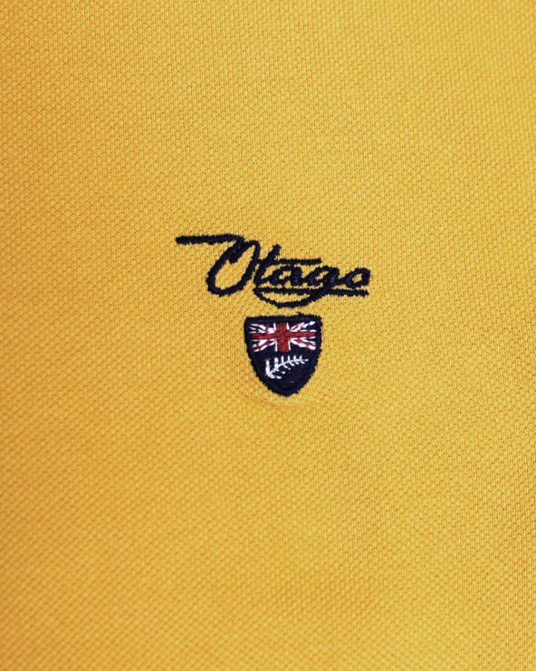 Broderie côté coeur du polo Abruzzo Otago mimosa pour homme