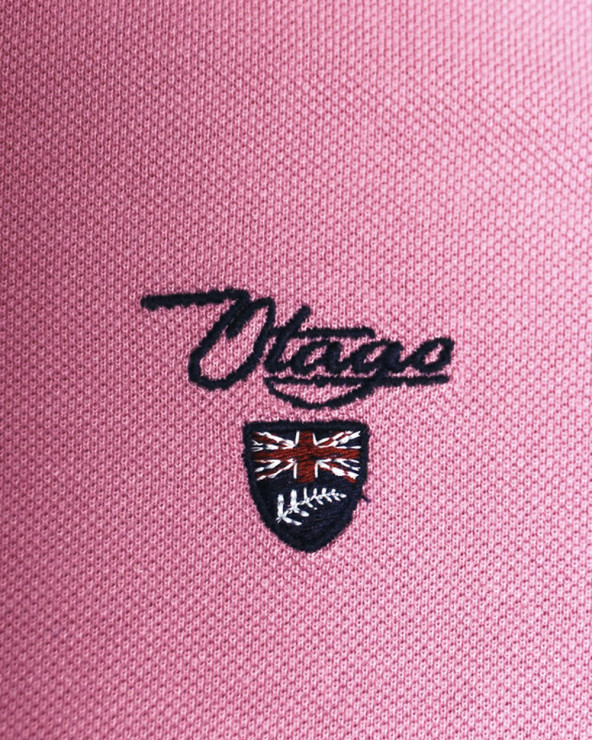 Broderie côté coeur du polo Abruzzo Otago rose pour homme