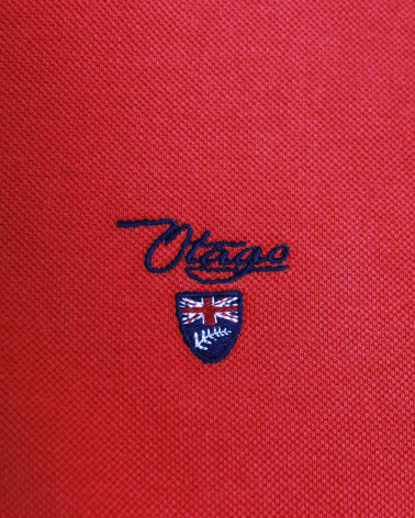 Broderie côté coeur du polo Abruzzo Otago rouge pour homme