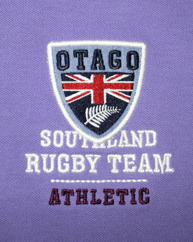 Broderie côté coeur du polo Artax Otago parme pour homme