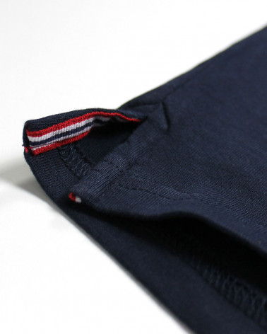 Patte avec liseré aux ouvertures latérales du polo Beachvichy Otago bleu marine pour homme