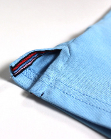 Patte avec liséret aux ouvertures latérales du polo Torture7 Otago pour homme