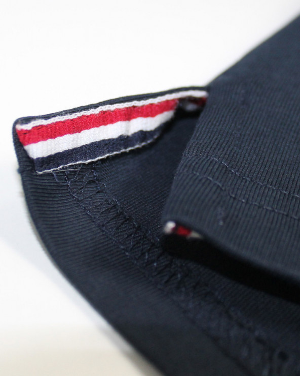 patte latérale d'ouverture du Polo homme manches longues Tikmont Otago rugby marine