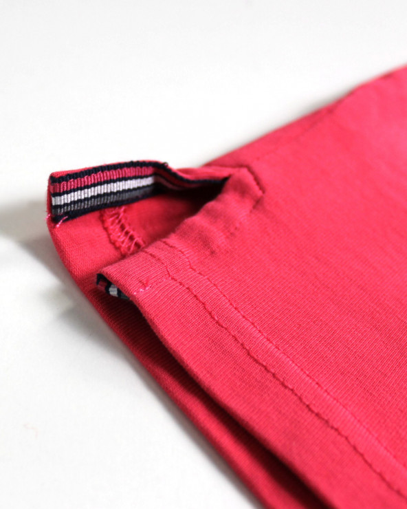 patte d'ouverture latérale du Polo corail homme manches longues Otabasic Otago rugby
