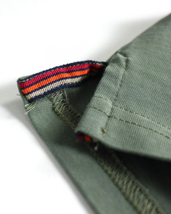 patte de l'ouverture latérale du Polo kaki homme manches longues Otabasic Otago rugby