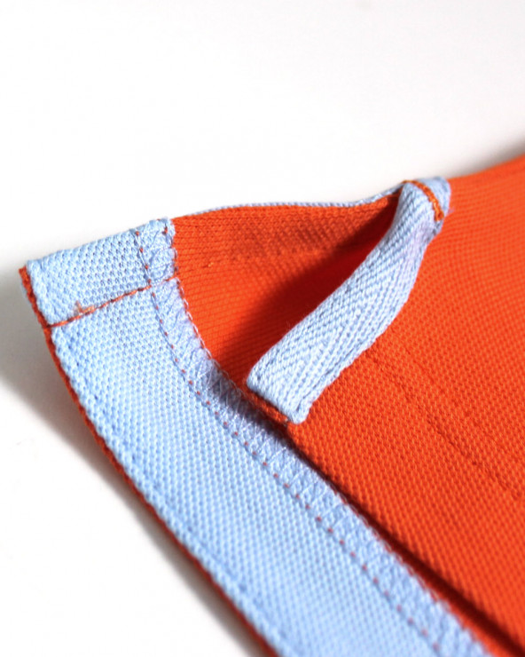 patte des ouvertures latérales de confort du Polo manches courtes orange pour homme Bota Otago rugby