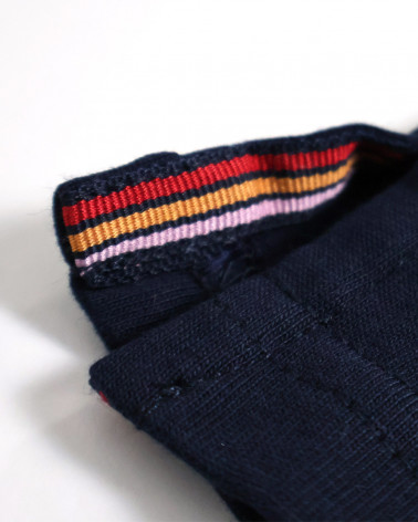 patte d'ouverture latérale du Polo manches courtes Pacitort Otago rugby bleu marine pour homme