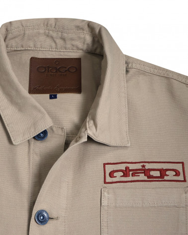 col et broderie côté cœur de la Veste Toile Boutonnée Otago Rugby beige pour Homme