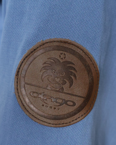 écusson cousu sur la manche de la Veste Toile Boutonnée Ohio Otago Rugby indigo marine pour Homme