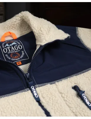 détail de la veste polaire écru marine pour homme OTASHERPA stone Otago rugby